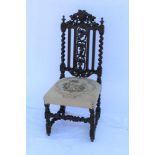 A LATE 19TH CENTURY CAROLEAN DESIGN SINGLE CHAIR, with green man mask crest rail, grape & vine