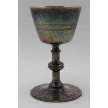 A SILVER PLATED CHALICE on knopped stem and circular platform foot, with engraved cross in