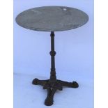 A GREY VEINED MARBLE CIRCULAR TOPPED DRINKS TABLE on slender reeded cast metal black finished