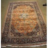 A WOVEN WOOLLEN ROOM SIZED FLOOR CARPET stylised Persian design, approx 204cm x 314cm