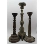 A 19TH CENTURY EMBOSSED BRASS ITALIAN CANDLE HOLDER, having urn sconce over a stem of swags and