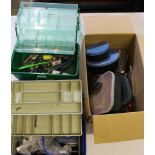 A SELECTION OF FISHING EQUIPMENT to include slingshots, feeders, hooks, weights, weighing scales,