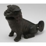 A CHINGDYNASTY CHINESE CAST BRONZE TEMPLE DOG with wagging tail, 12cm high