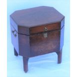 A 19TH CENTURY MAHOGANY CELLARETTE OF CANTED FORM, hinged lid reveals fitted interior, side carrying