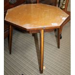 AN ART DECO DESIGNED BIRDSEYE MAPLE OCTAGONAL TOPPED TABLE beneath glass protector, support on