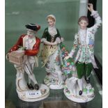 A PAIR OF CONTINENTAL PORCELAIN MALE & FEMALE FIGURES in the style of Sitzendorf together with one