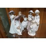 FIVE VARIOUS LARGE SIZED SPANISH FEMALE FIGURINES, one with child