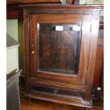 A SMALL WOODEN PART GLAZED DISPLAY CABINET, fitted with a single storage drawer