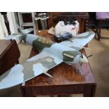 A REMOTE CONTROLLED MODEL SPITFIRE complete with accessories