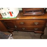 AN OAK FINISHED DRESSER UNIT, having twin shelved plate rack back, on a base unit