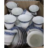 A BOX CONTAINING AN AYNSLEY BLUE MIST PATTERNED PART TEA SERVICE