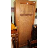 A MID 20TH CENTURY UTILITARIAN SINGLE DOOR WARDROBE