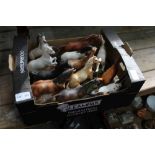 A BOX CONTAINING A SELECTION OF MODEL HORSES