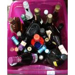 A LARGE CERISE PLASTIC CRATE OF ALCOHOLIC BEVERAGES
