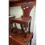 A 19TH CENTURY MAHOGANY HALL CHAIR with fancy shaped back & solid seat