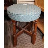 A CIRCULAR PAD TOPPED STOOL on four turned & blocked legs, united by an 'X' shaped stretcher
