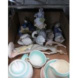A BOX CONTAINING A SUSIE COOPER PART TEA SERVICE together with porcelain model, human and animals