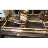 A 19TH CENTURY HELMET SHAPED COPPER COAL SCUTTLE with scoop, 44cm high, together with a brass &