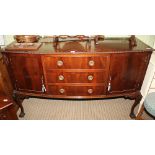 A REPRODUCTION MAHOGANY BOW FRONTED SIDE BOARD with three central drawers, flanked by two cupboard