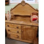 A 19TH CENTURY PINE SIDEBOARD UNIT having associated high back top with display shelf, base unit