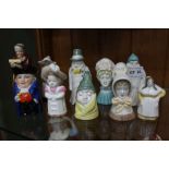 TEN PIECES OF ROYAL WORCESTER PORCELAIN FIGURINES, the majority candle snuffers