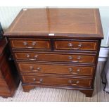 A GOOD QUALITY REPRODUCTION MAHOGANY FINISHED CHEST OF FIVE DRAWERS, two inline over three