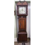 AN EARLY 19TH CENTURY OAK & MAHOGANY LONG CASE CLOCK, having double swan neck pediment, pilaster