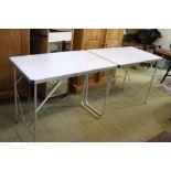 A FOLDING TRESTLE TABLE