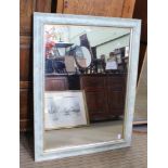 A LARGE RECTANGULAR PLAIN PLATE WALL MIRROR, in paint effect frame