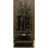 A CARVED WOODEN SHRINE