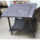 A POSSIBLE INDIAN CARVED WOODEN RECTANGULAR TOPPED TABLE on four splayed bobbin turned legs, with