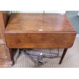 A 19TH CENTURY MAHOGANY PEMBROKE TABLE having twin opposing dummies, on four turned legs with