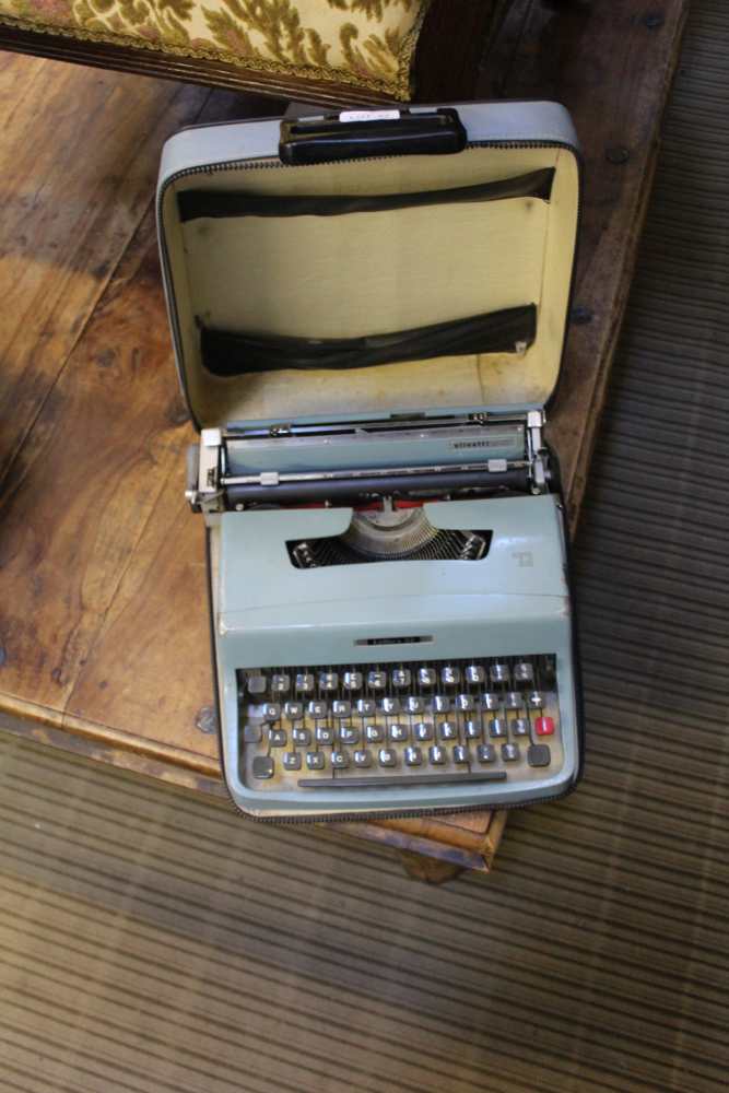 A CASED OLIVETTO LETTERA 32 FINISHED IN BLUE