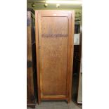 A MID 20TH CENTURY UTILITARIAN SINGLE DOOR WARDROBE