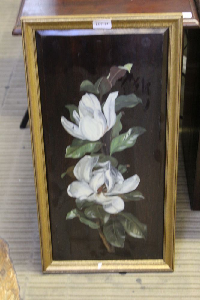 A HAND PAINTED FLORAL DESIGN WOODEN PANEL in gilt frame