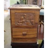 A PROBABLE AFRICAN CARVED WOODEN BOX, with lift off lid and a single drawer