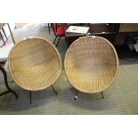 A PAIR OF MID-CENTURY WOVEN WICKER MODERNIST CHAIRS on painted black metal frames