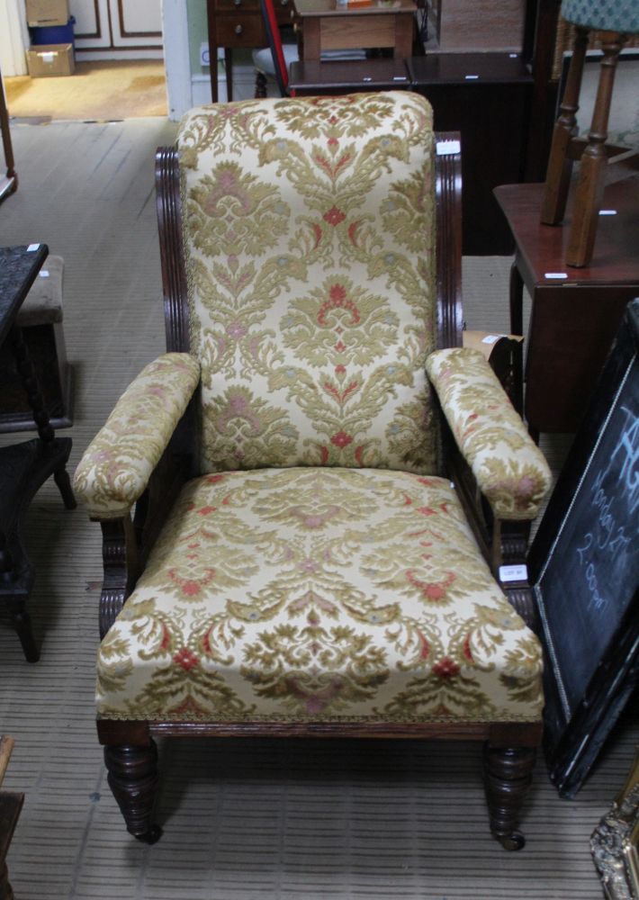 AN 19TH CENTURY SHOW WOOD FRAMED DEEP SEATED SALON ARMCHAIR with old gold flock upholstered back