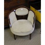 AN EDWARDIAN INLAID MAHOGANY SHOW WOOD FRAMED TUB ARMCHAIR with corduroy upholstered pads, supported