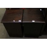 A PAIR OF MAHOGANY COLOURED IMPORTED HARDWOOD STORAGE DEVICES with lift-up lids & hollow bodies