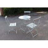 A DUCK EGG BLUE PAINTED FOLDING PATIO SUITE comprising; circular top table and three wooden