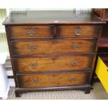 A 19TH CENTURY MAHOGANY FINISHED CHEST OF FIVE DRAWERS supported on short bracket feet