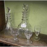 TWO EARLY 19TH CENTURY DECANTERS & STOPPERS together with three drinking glasses, one engraved '