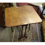 A LATE 19TH CENTURY MAHOGANY SUTHERLAND TYPE TABLE on ring turned legs
