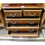 A GOOD QUALITY REPRODUCTION MAHOGANY FINISHED SMALL SIZED CHEST OF FIVE DRAWERS