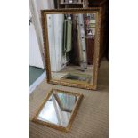 TWO GILT FRAMED WALL MIRRORS