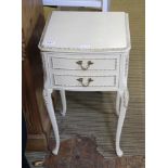 A MARIE ANTOINETTE DESIGN TWO DRAWER BEDSIDE UNIT, supported on long cabriole design legs