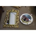 A MOULDED PLASTIC GILT FRAMED PLAIN PLATE MIRROR together with a decorative retro wall light