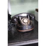 A VINTAGE METAL DIAL TELEPHONE by Bell Industries