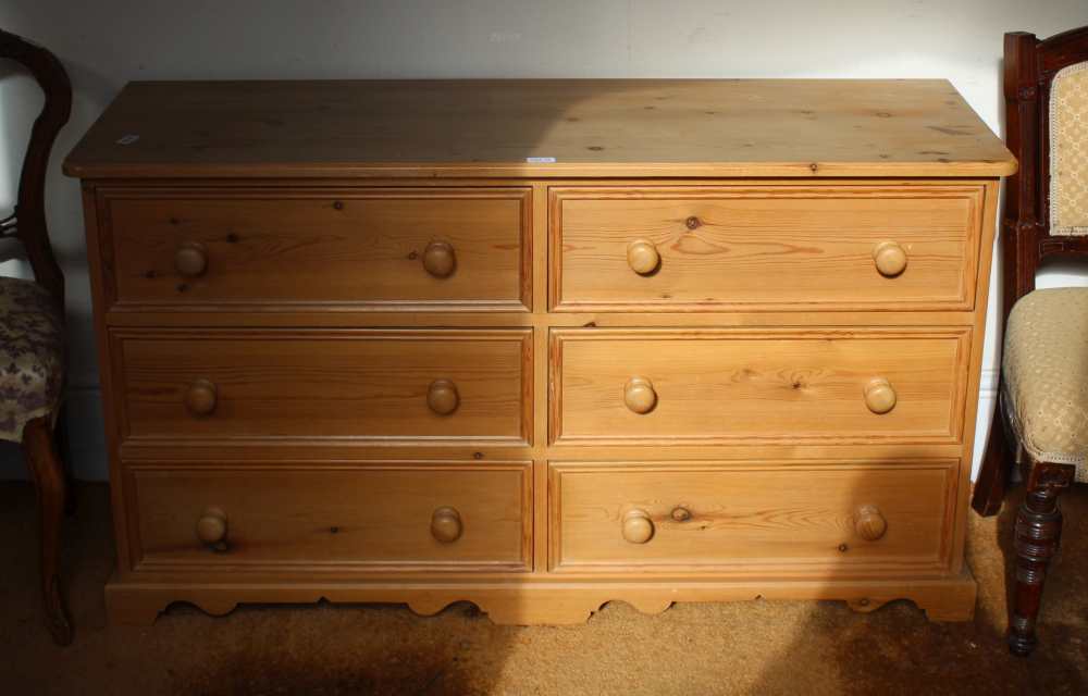 A MODERN PINE DOUBLE WIDTH CHEST OF SIX DRAWERS